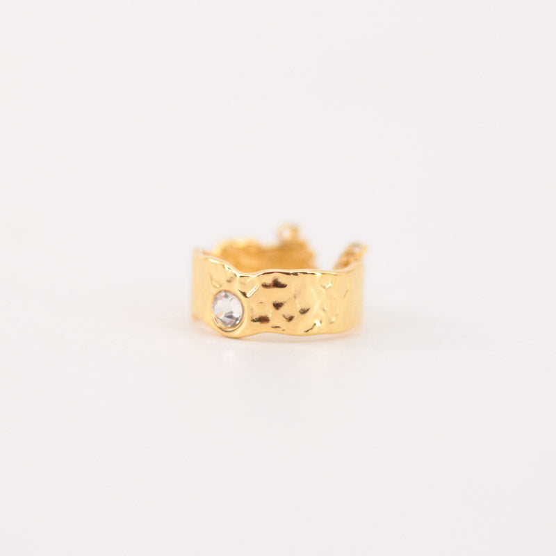 Anillo dorado con brillo
